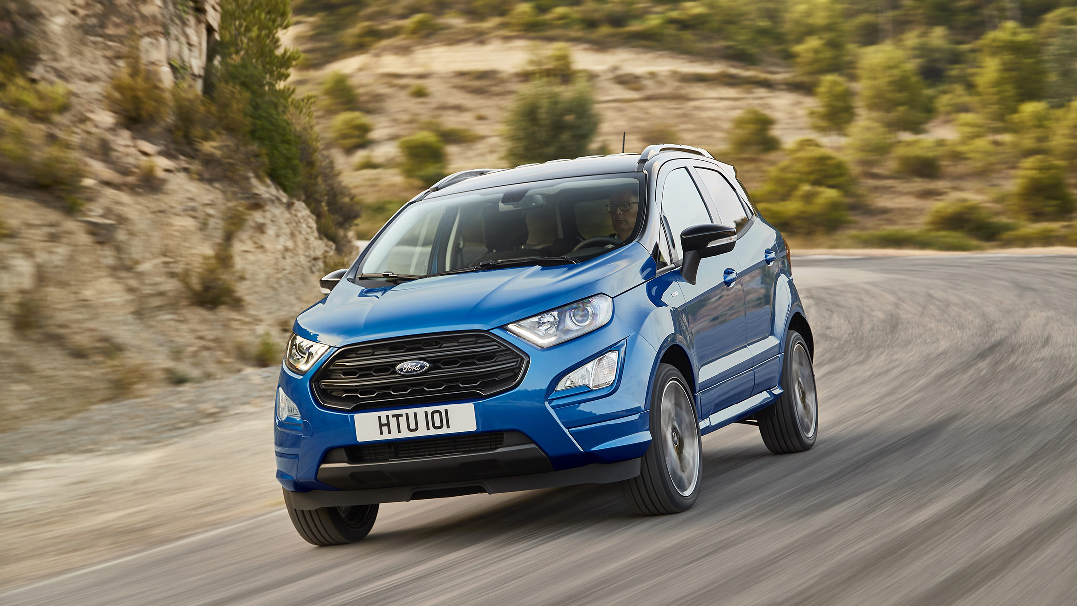 Blue Ford EcoSport driving