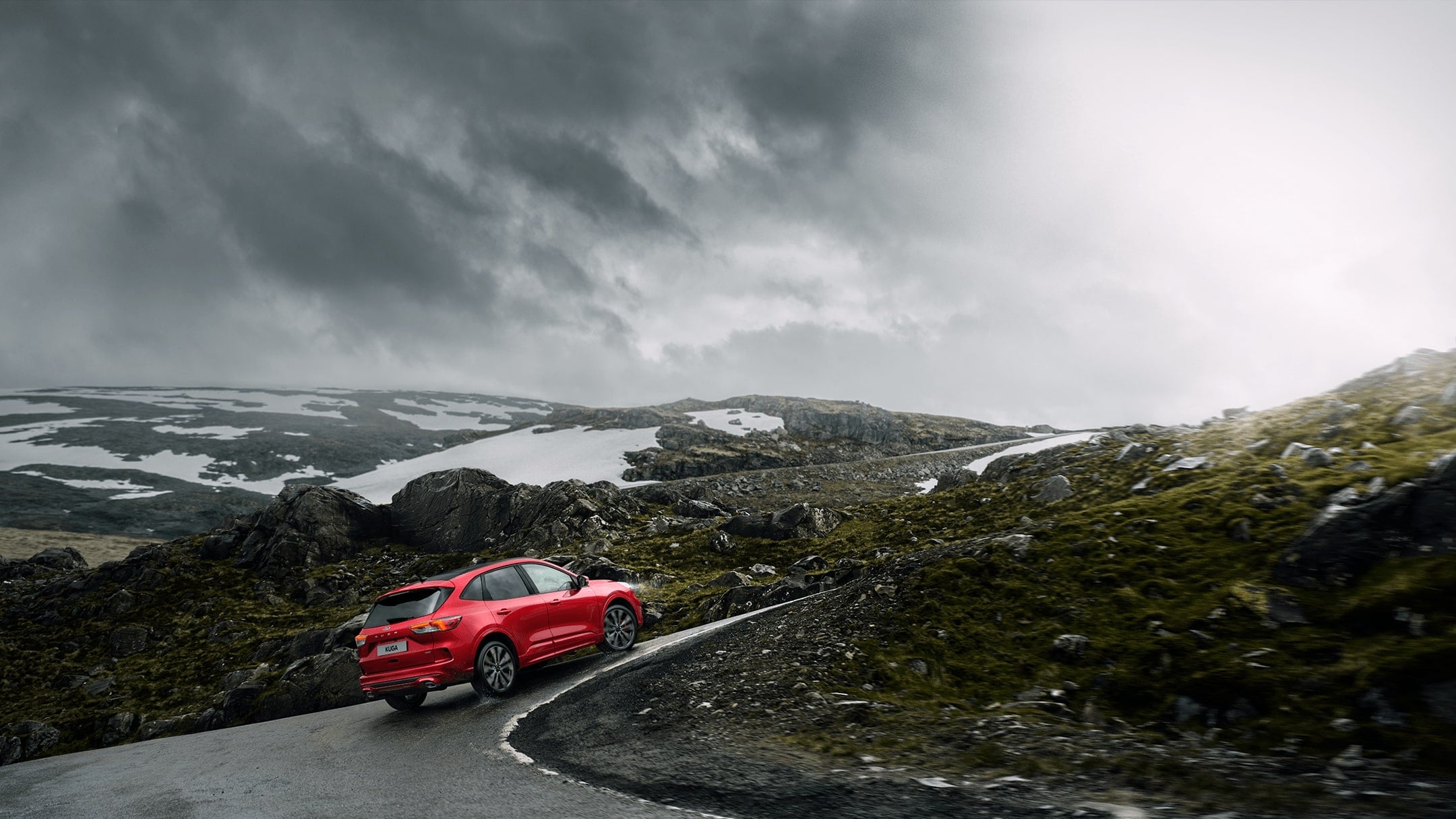 Red Ford Kuga on the road