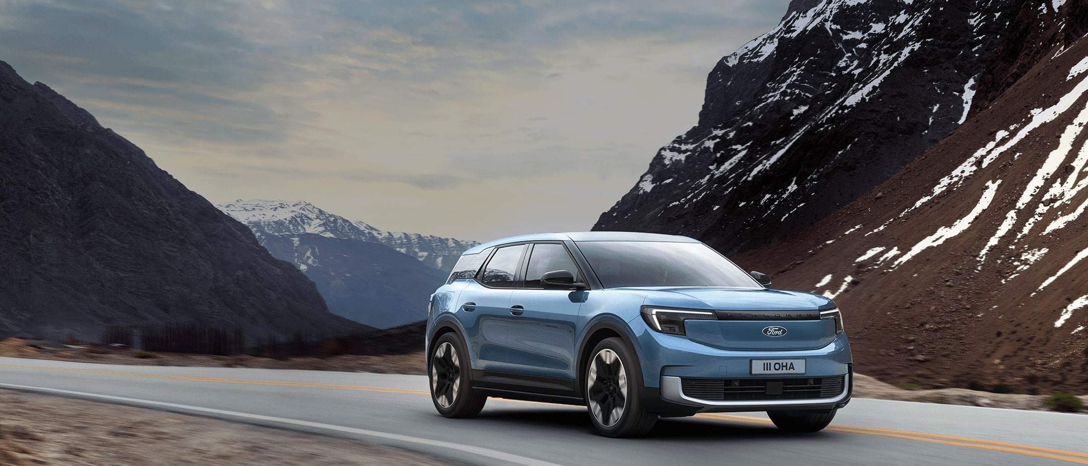 The New All-Electric Explorer being driven through wild landscape