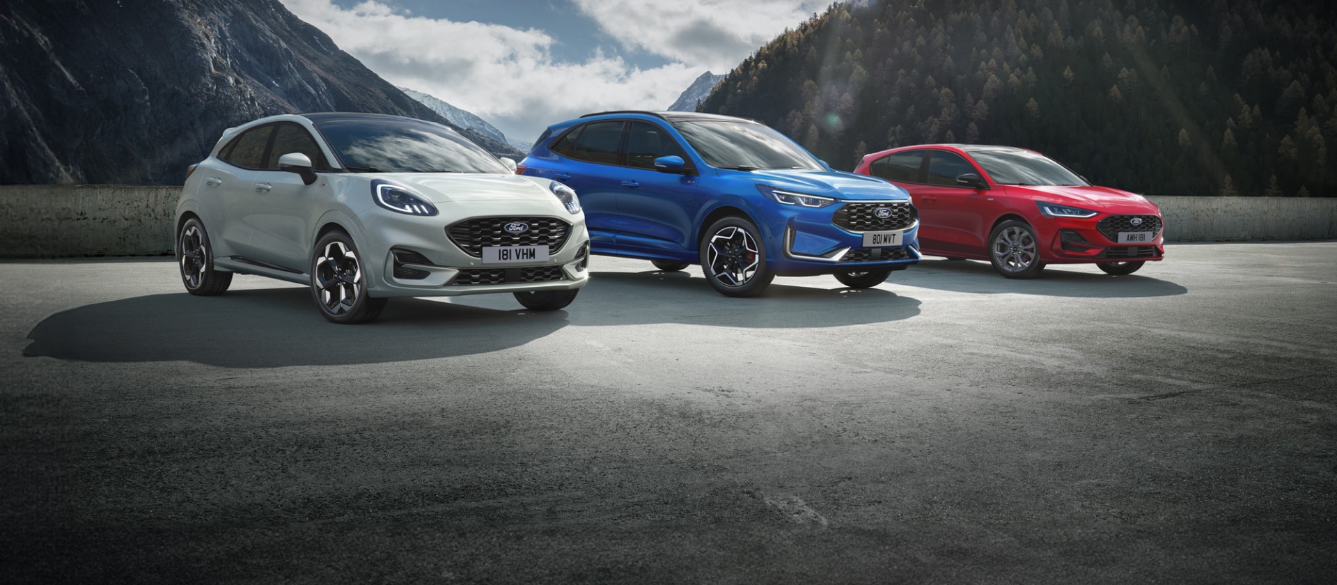 Line-up of Ford hybrid cars, including the Ford Puma, Ford Kuga and Ford Focus.