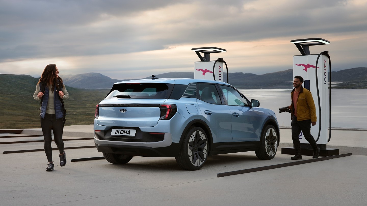 All-electric Ford Explorer charging on the street