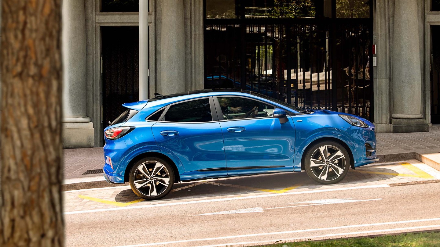 Blue Ford Puma on the road