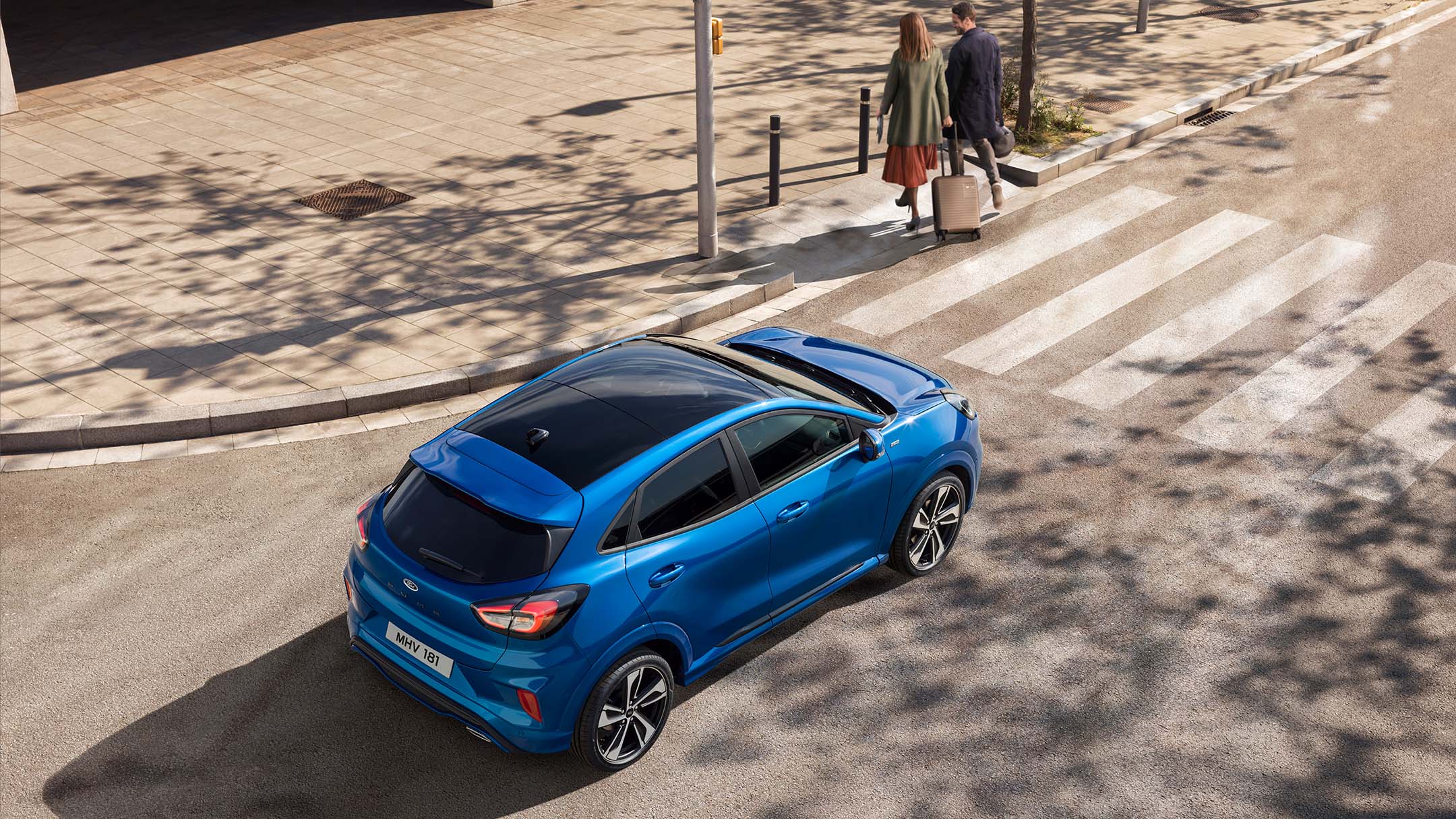 Blue Ford Puma on the road