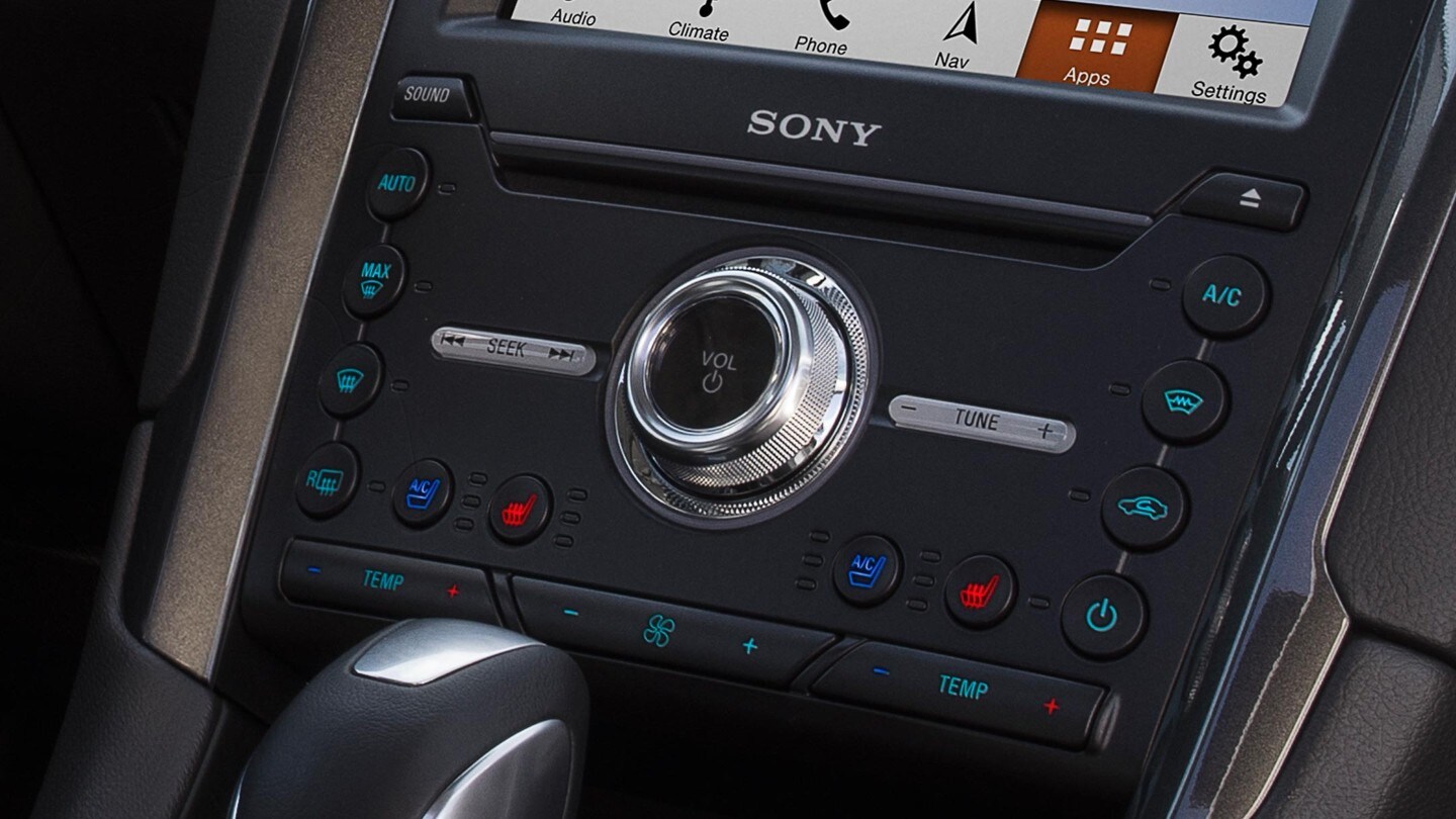 A detail of stick shift and automatic temperature control