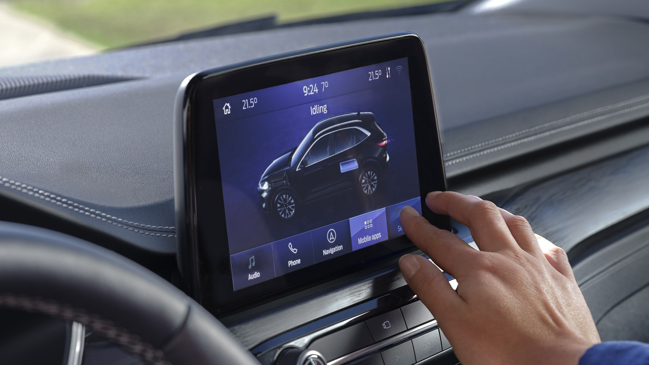 Het interieur van De Ford Kuga Plug-In Hybrid met LCD scherm