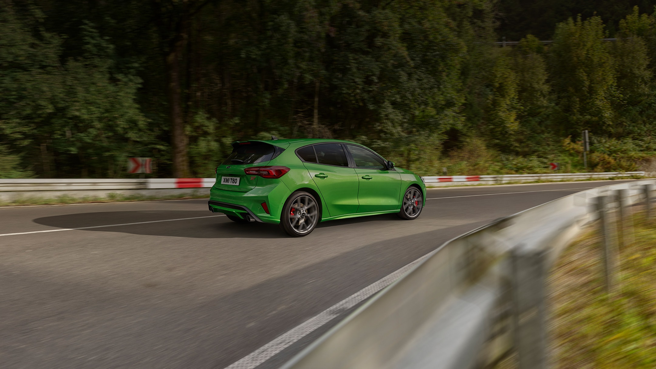 Rear three quarter view of a Ford Focus ST in motion