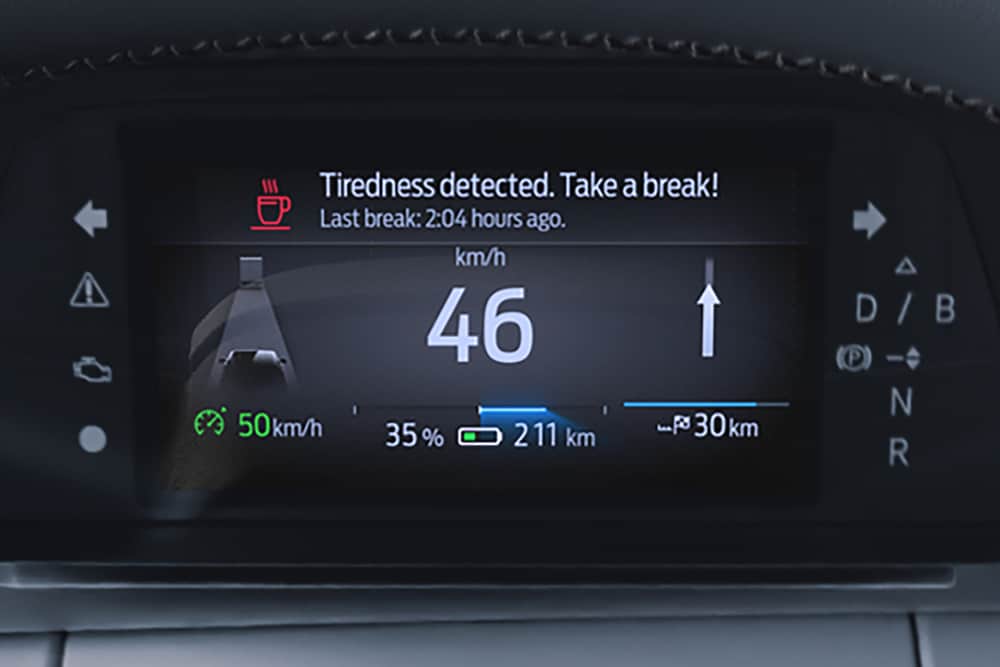Close-up van het Driver Alert-dashboard van de Ford Capri® dat laat zien wanneer het tijd is om te rusten.