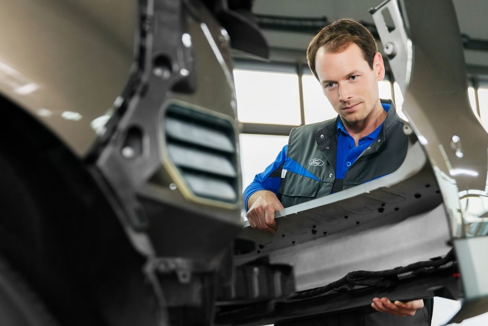 Ford Service engineer, replacing front bumper