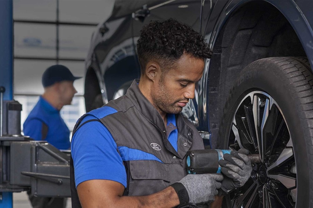 Ford Service engineer, tightening wheel bolts