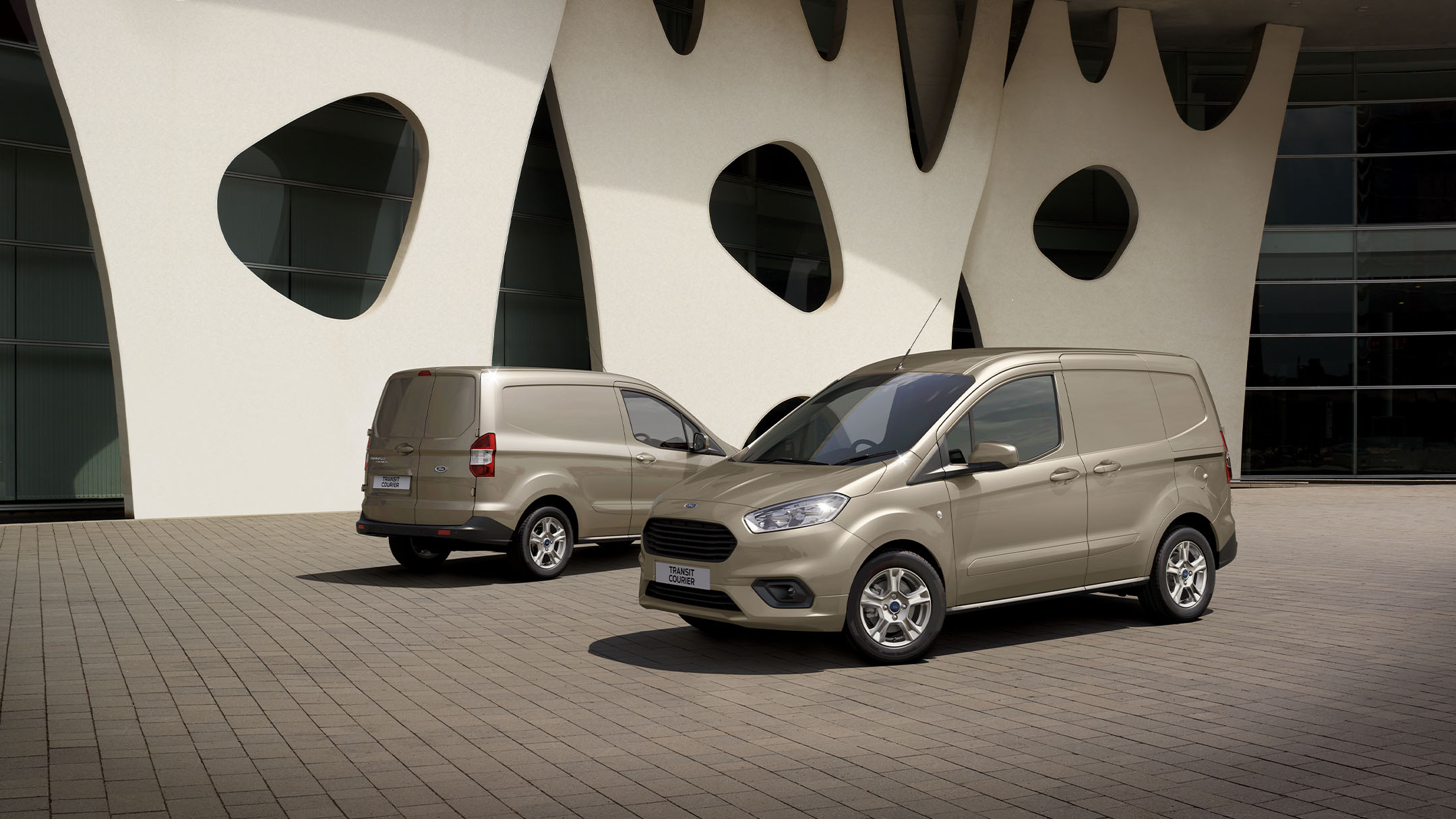 Ford Transit Courier parked next to florist store