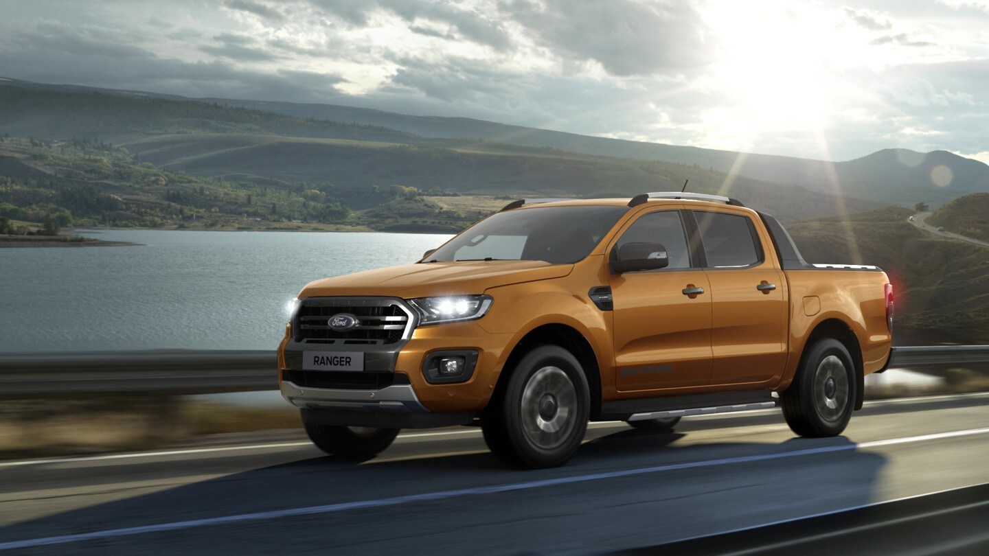 Orange Ford Ranger on the road