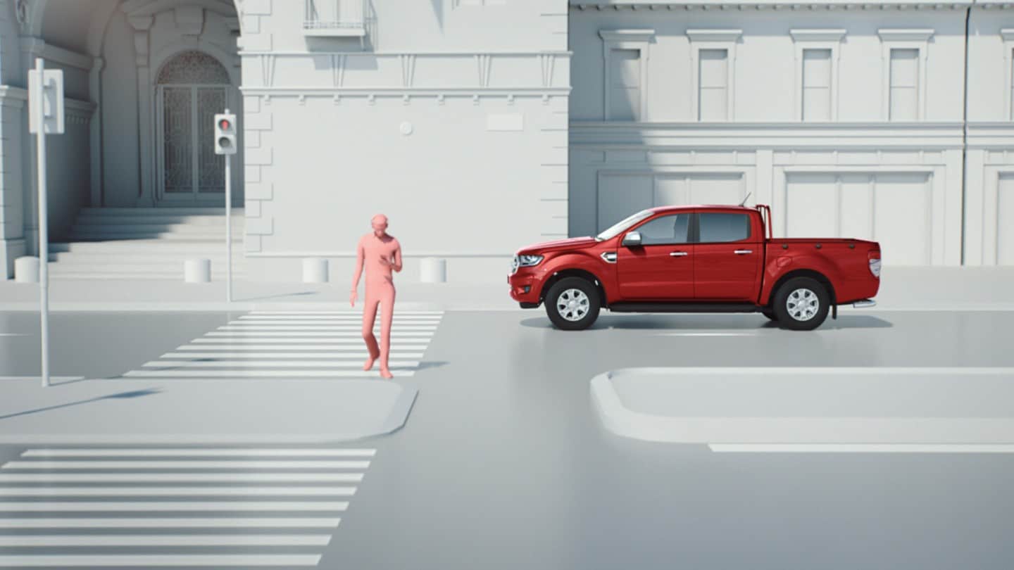 Ford Ranger on the road with pre-collision graphic
