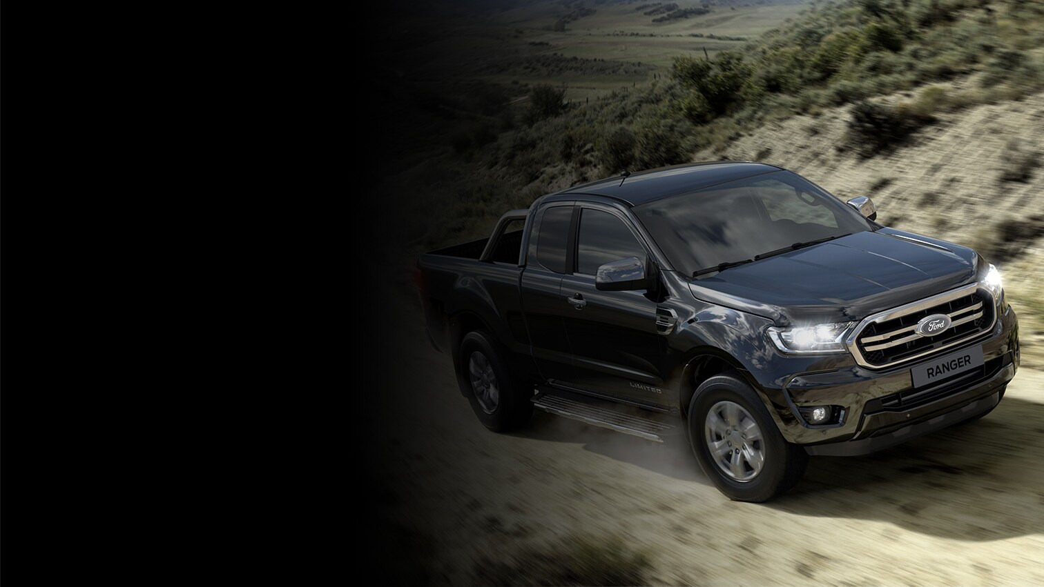 Ford Ranger Super Cab driving on rural road