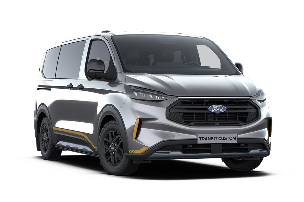 Vooraanzicht (links) van een donkergrijze Ford Transit Custom Kombi Trail tegen een witte achtergrond.