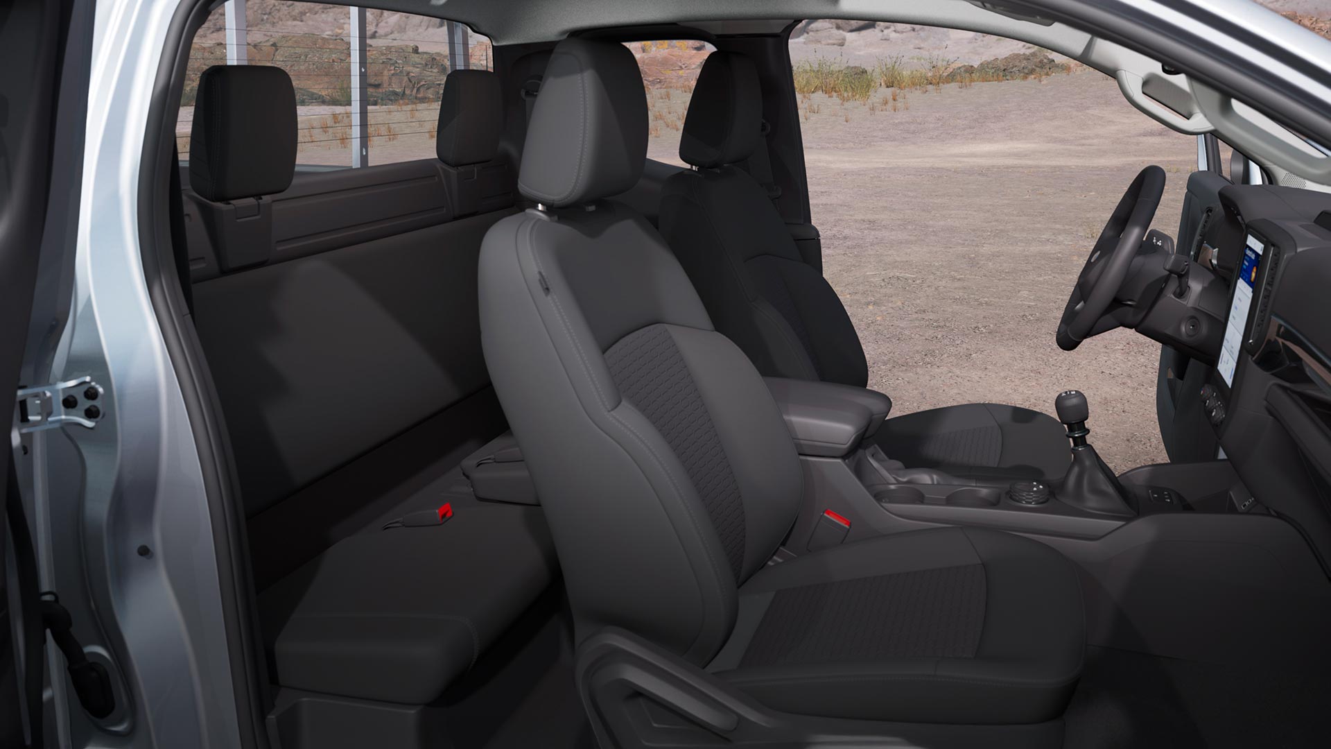 Profielaanzicht door het interieur van de cabine van een Ford Ranger XLT met supercabine.