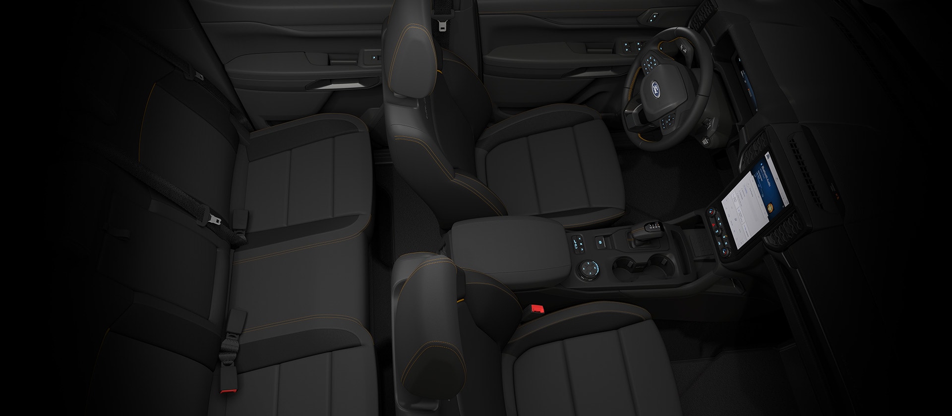 Bovenaanzicht van het interieur van een Ford Ranger met dubbele cabine, met het dashboard in beeld.