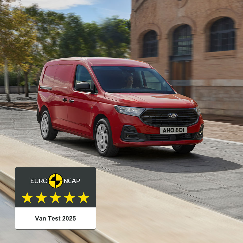 Ford Transit Connect Trend in Lava Red, showing front grille and automatic headlights.