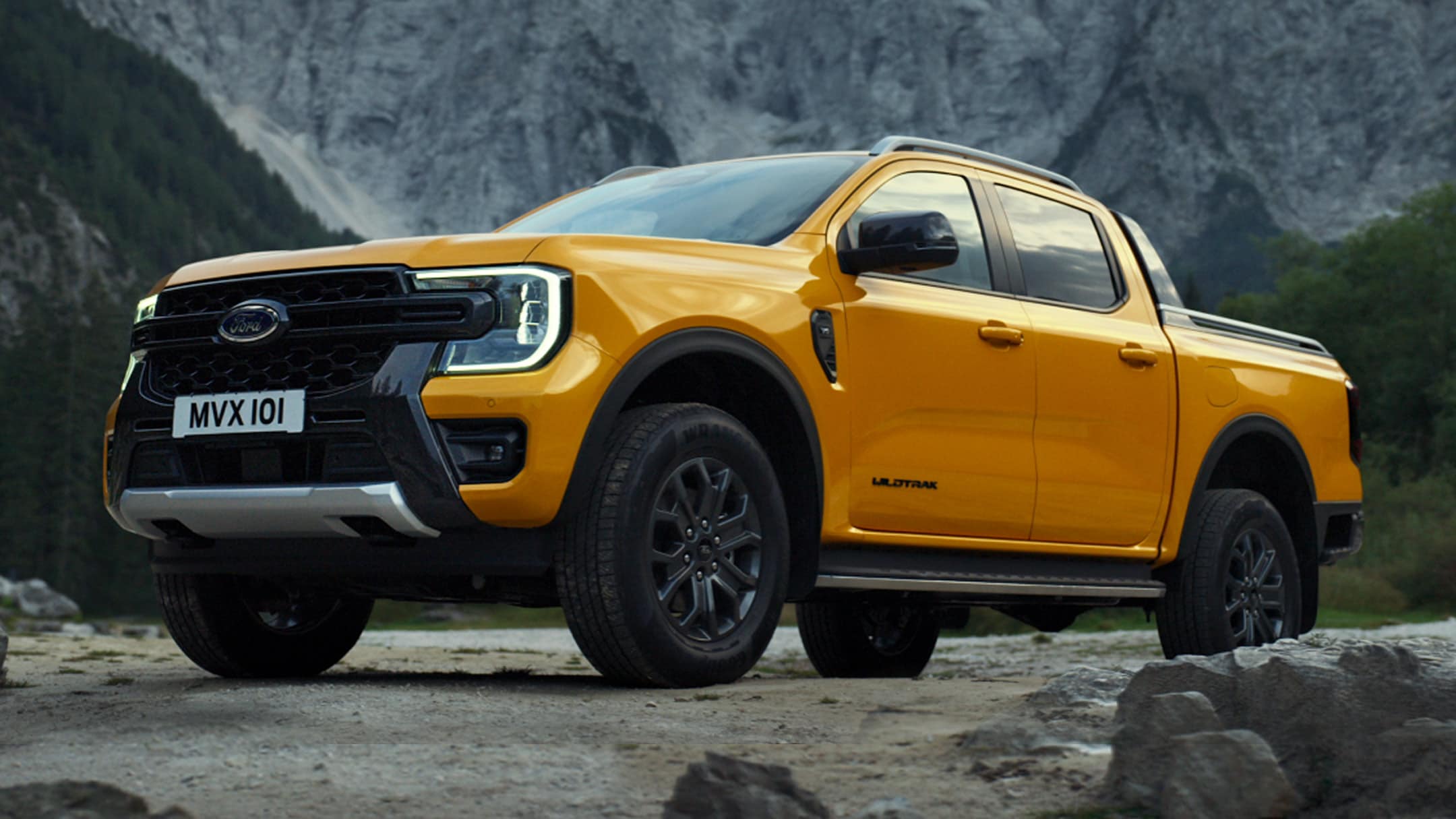 All-New Ford Ranger front 3/4 view parked by mountains