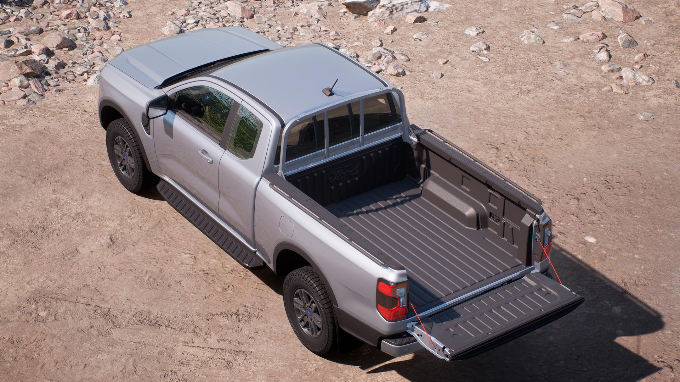 All-New Ford Ranger moondust silver 3/4 rear view from above showing load bed