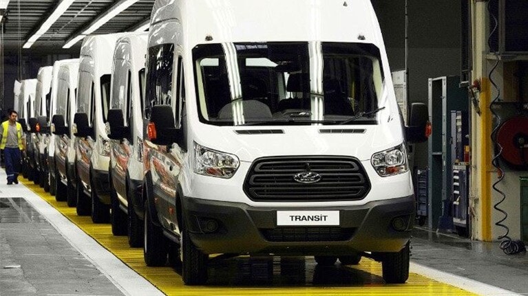 Ford Transits standing in row in factory