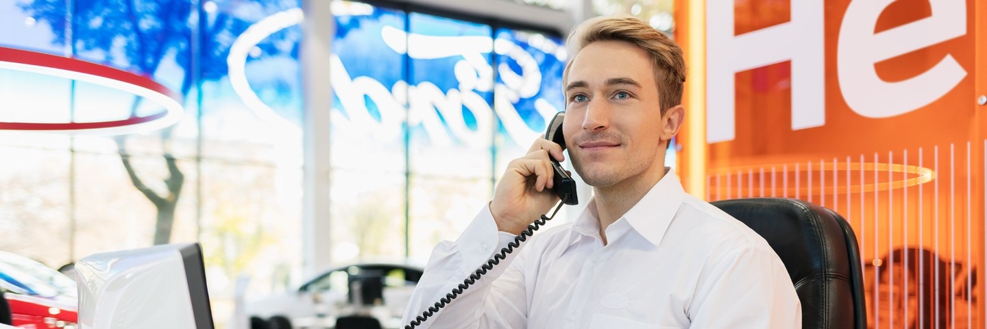 A Ford salesman on the phone