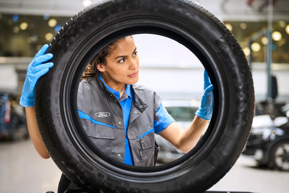 Guy choosing the right tyre