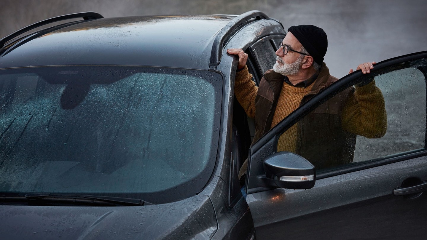 Man looking out of the car