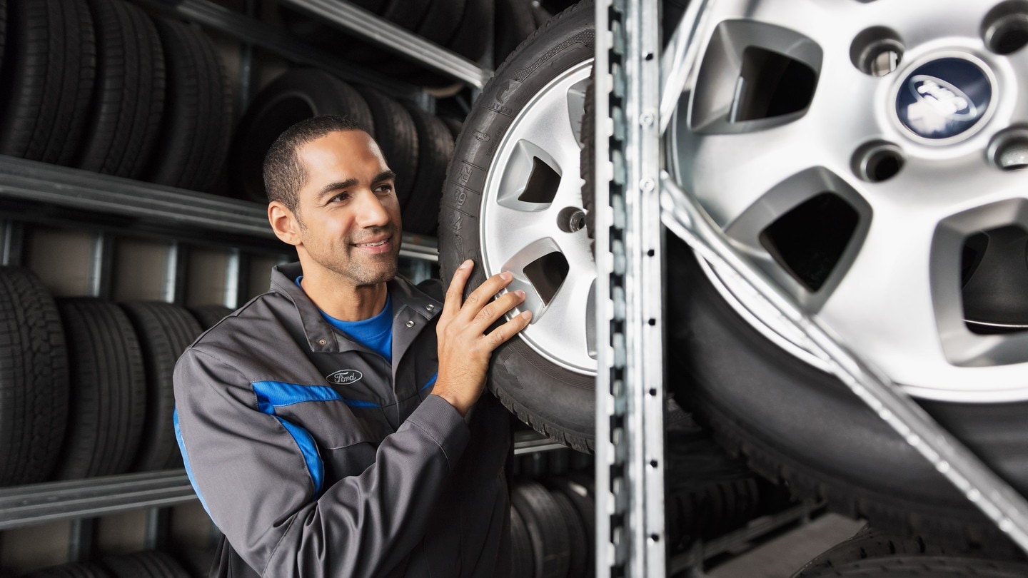 Guy choosing the right tyre